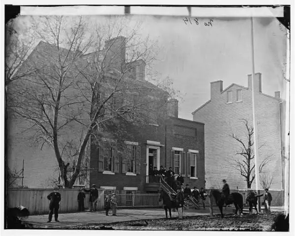 Col. Benjamin F. Fisher and staff on steps of Signal Corps headquarters, 1816 F St., NW
