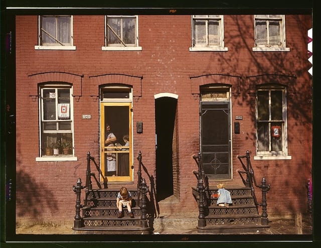 Children on rowhouse steps