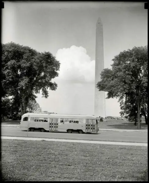 Streamlined street car passing Washington Monument (1938)