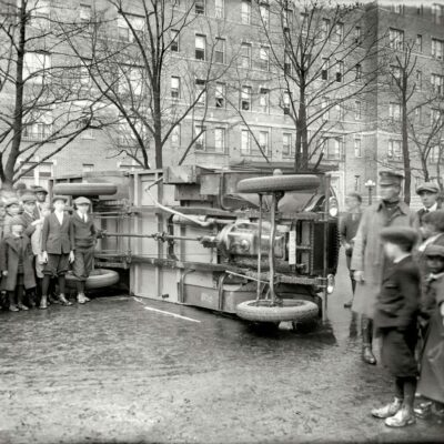 Overturned bus in Petworth (1921)