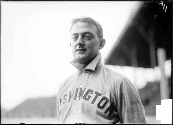 Half-length portrait of Charles Moran, baseball player for the American League Washington Senators, standing at South Side Park which was located at West 37th Street, South Princeton Avenue, West Pershing Road (formerly West 39th Street), and South Wentworth Avenue in the Armour Square community area of Chicago, Illinois.