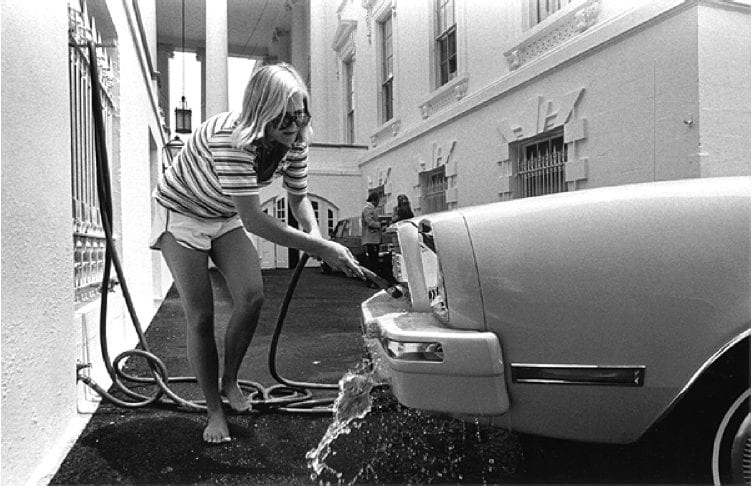 Susan Ford washing her car at the White House (1976)