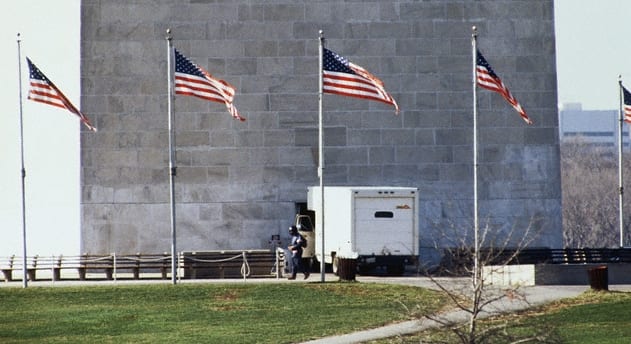 Norman Mayer and his van and the base of the Washington Monument