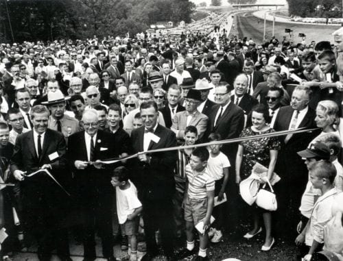 In Maryland, the final link in I-495, the Capital Beltway, was opened after ceremonies on August 17, 1964. Ribbon cutters (l. to r) are Rex Whitton, Governor J. Millard Tawes, and Chairman John B. Funk of the Maryland State Roads Commission.