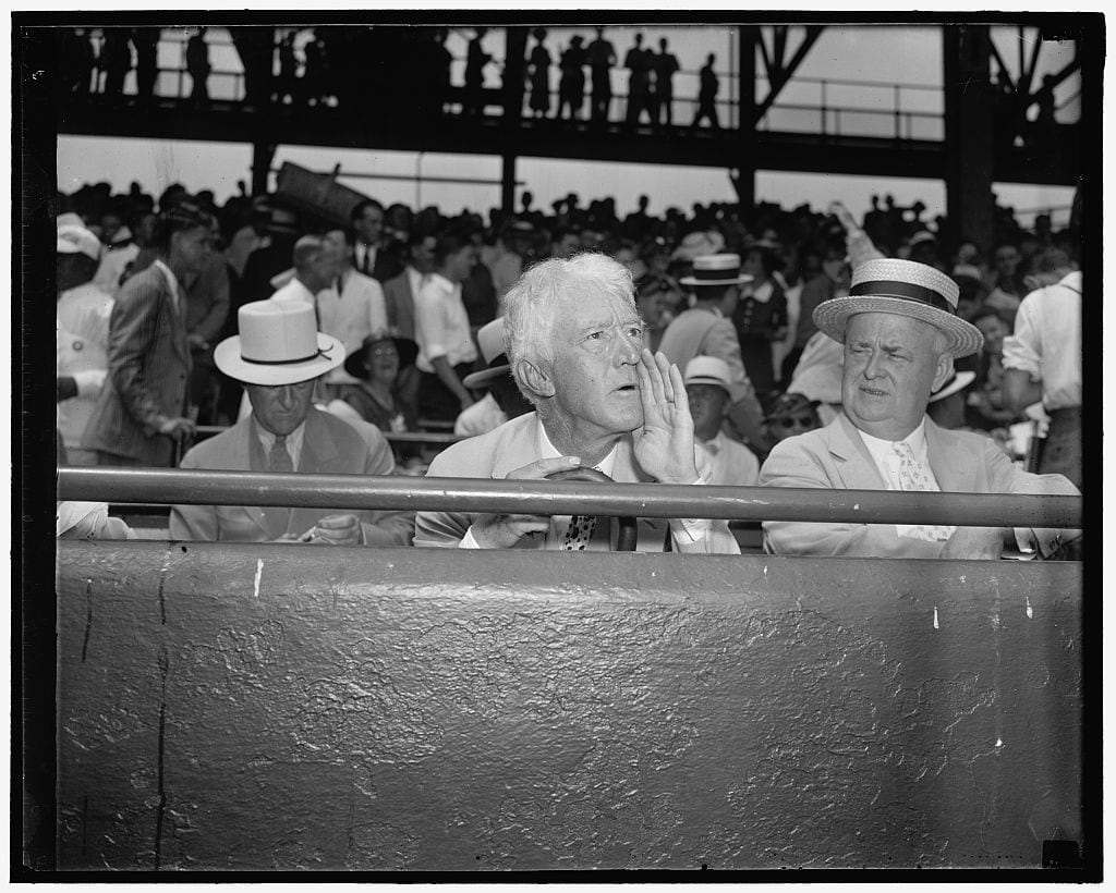 Landis assumes camera pose. Washington D.C., July 7. Kenesaw Mountain Landis, High Commissioner of baseball, assumes his characteristic pose for the cameramen as he views the 1937 all-star game in the Capitol (Library of Congress)