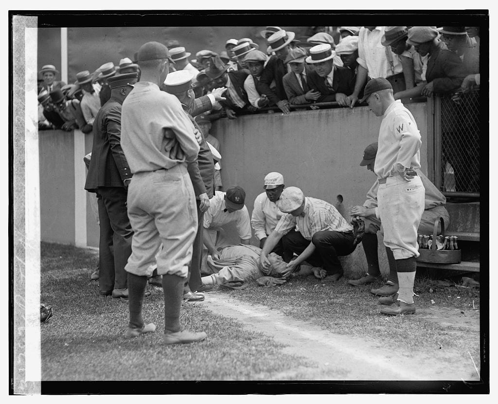 Babe Ruth lying unconscious at Griffith Stadium - July 5th, 1924 (Library of Congress)