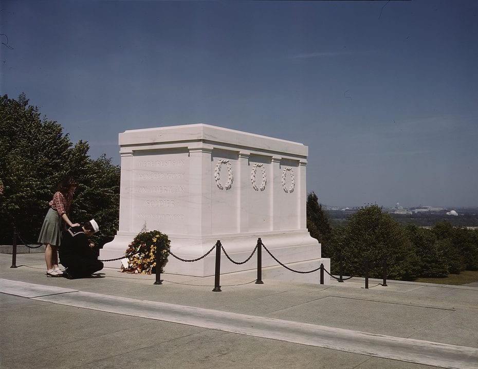 Sailor kneeling by the Tomb of the Unknown in 1943 (Library of Congress)