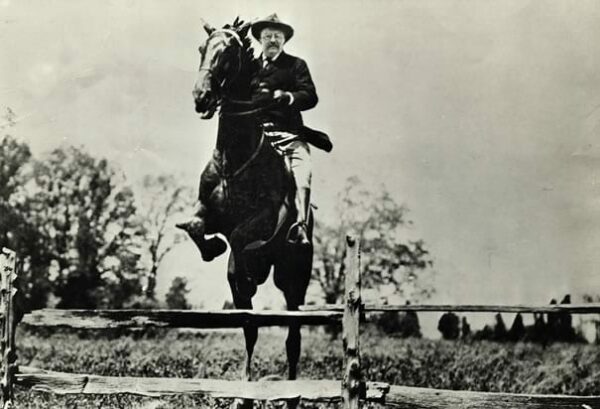 Teddy Roosevelt on horseback (History.com)
