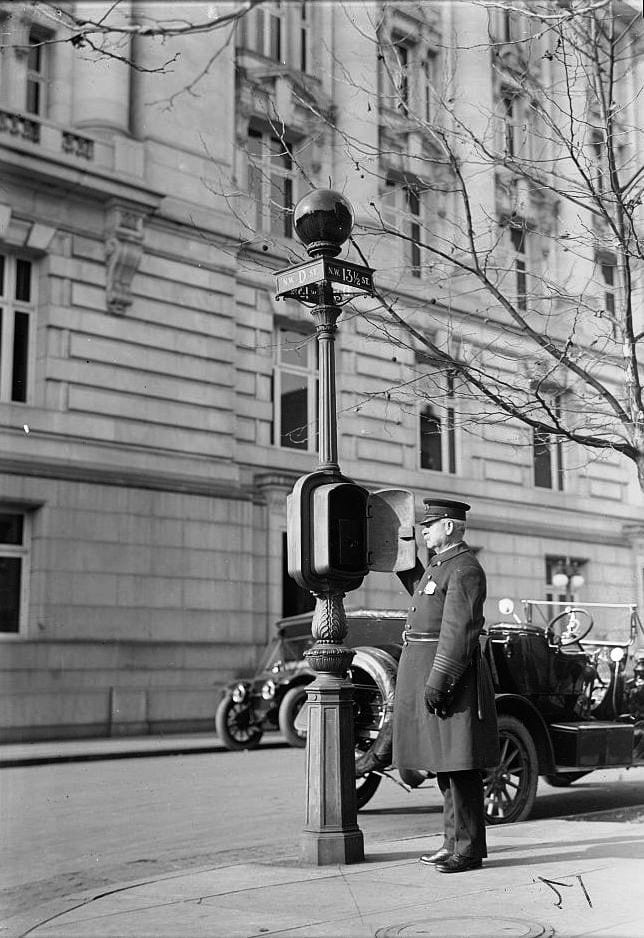 Police call box at 13 1/2 and D St. NW in 1912 (Wikipedia)