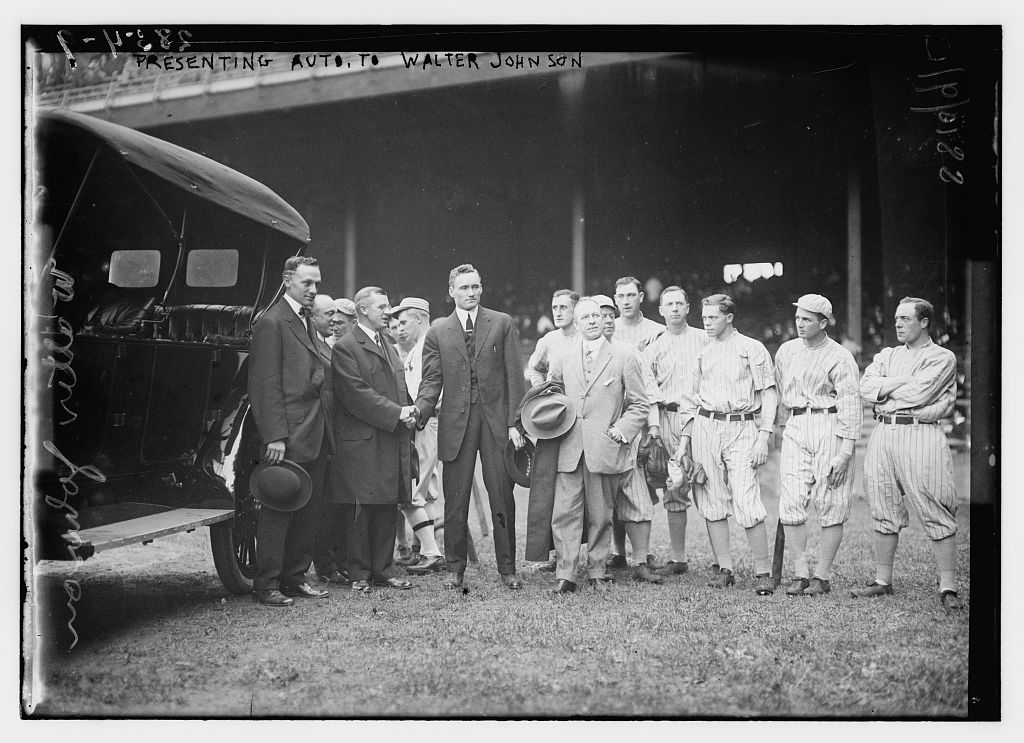 Walter Johnson presented with an automobile in 1913, his 36-win Chalmers Award MVP season