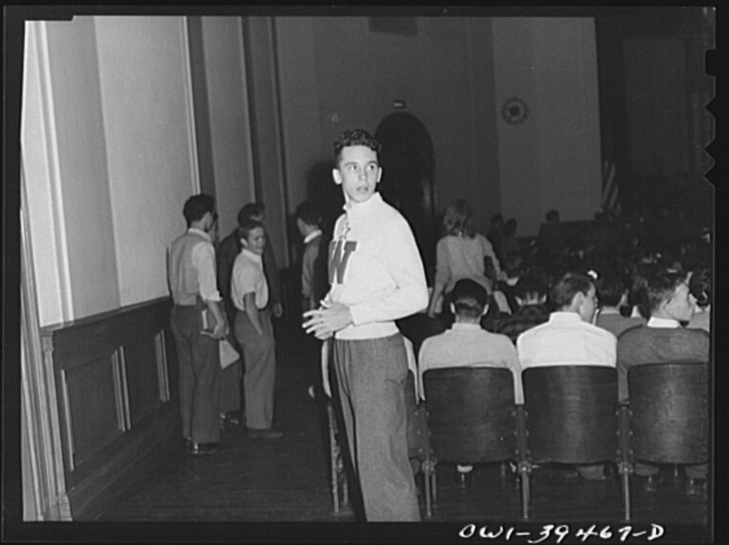 Walter Spangenberg acting as usher at a student assembly at Woodrow Wilson High School (Library of Congress)