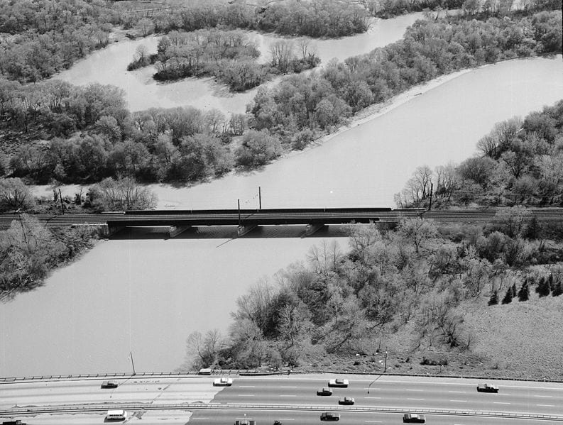 Image of Amtrak Anacostia River Bridge in Washington, D.C.. View looking south. The New York Avenue Bridge is seen in the foreground. 1977. (Wikipedia)