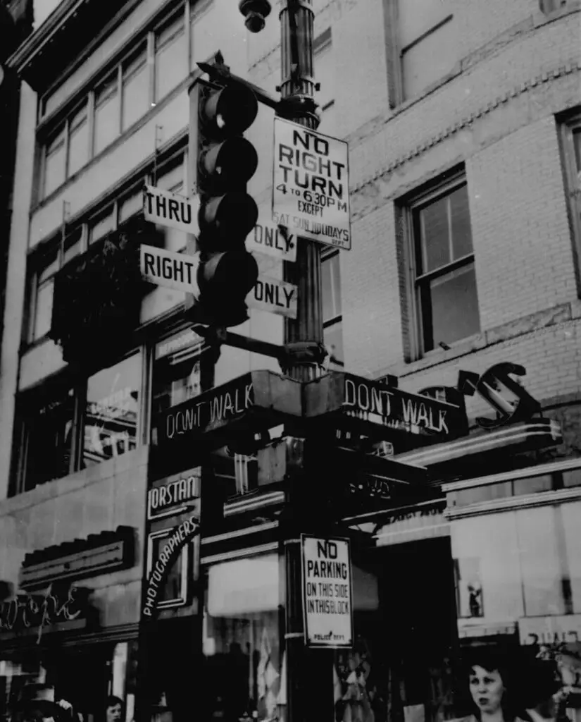 "Walk," "Don't Walk," "No Right Turn," "Thru Only": a complicated traffic signal to uncomplicate Washington, D.C., traffic, 1949. 306-PS-49-2682. (National Archives)