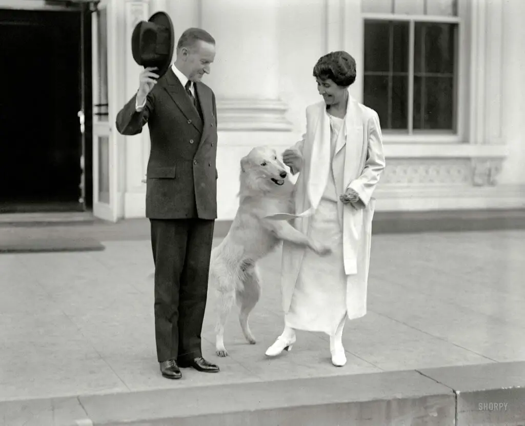 Calvin and Grace Coolidge with dog