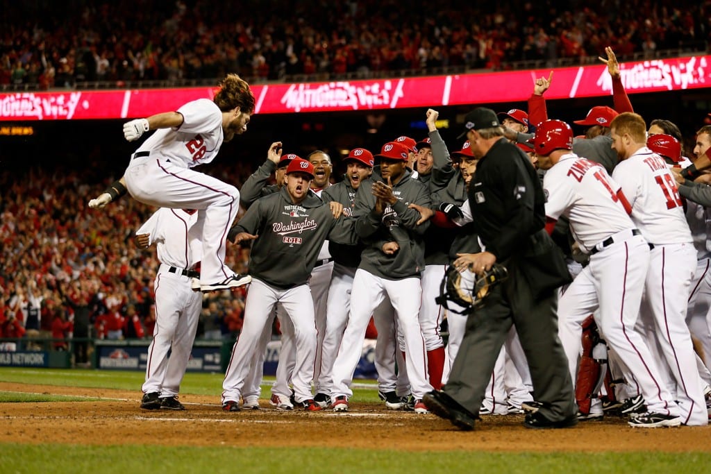 Jayson Werth scores (Robb Carr / Getty Images)  