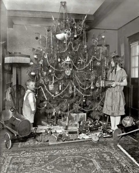 Washington, D.C., circa 1920. "Margaret Clark." A Christmas tree with all the trimmings, and a Buick. Harris & Ewing Collection glass negative.