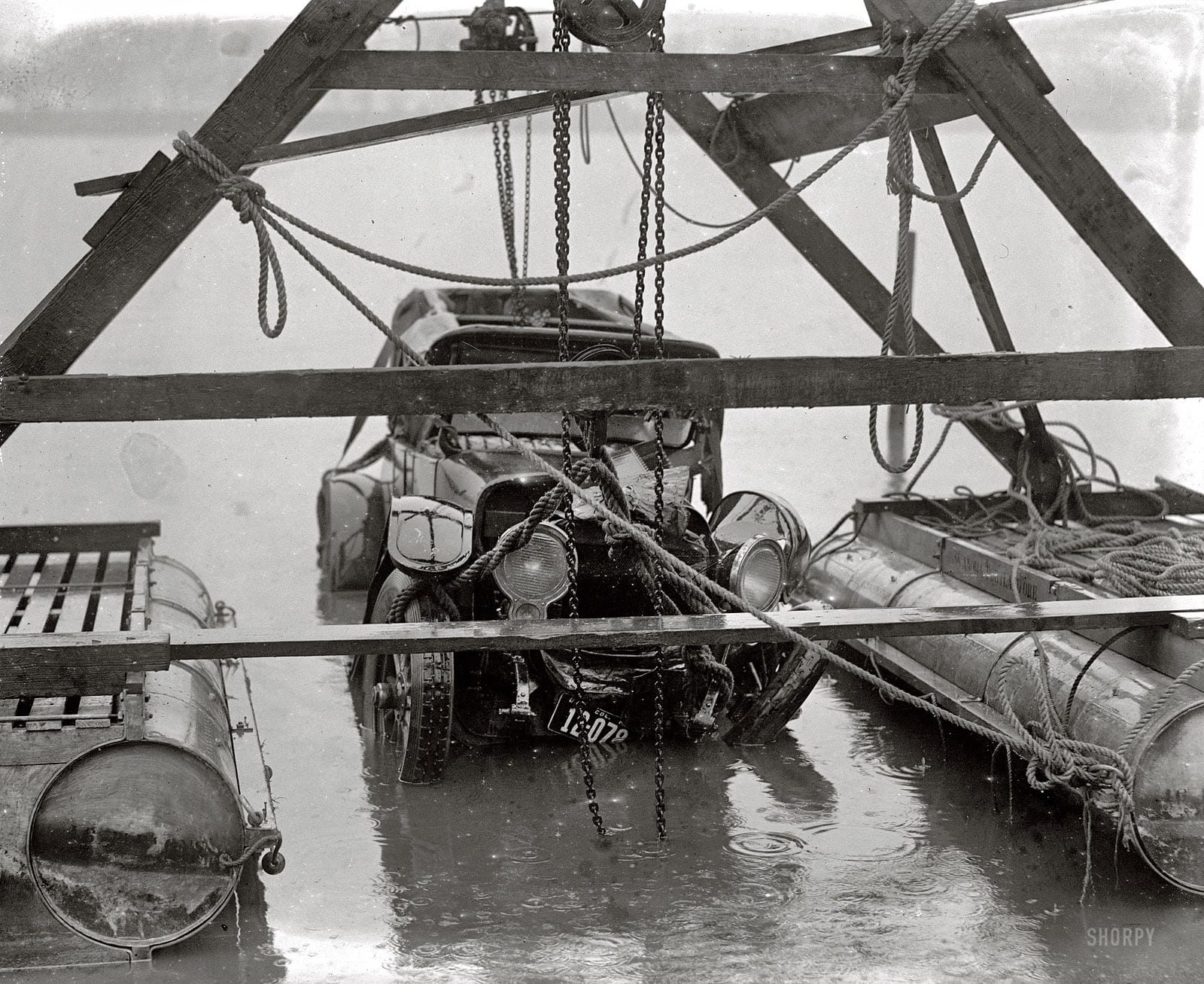 "Auto wreck. December 31, 1923." Continuing this week's theme of vehicular mishaps on (and off) the roads of Washington, D.C. On New Year's Eve, this car was in the drink. See the comments for details about this fatal accident in the Tidal Basin. National Photo Company Collection glass negative.