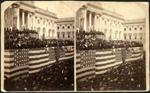 Chief Justice Morrison R. Waite administering the oath of office to Rutherford B. Hayes on a flag-draped inaugural stand on the east portico of the U.S. Capitol