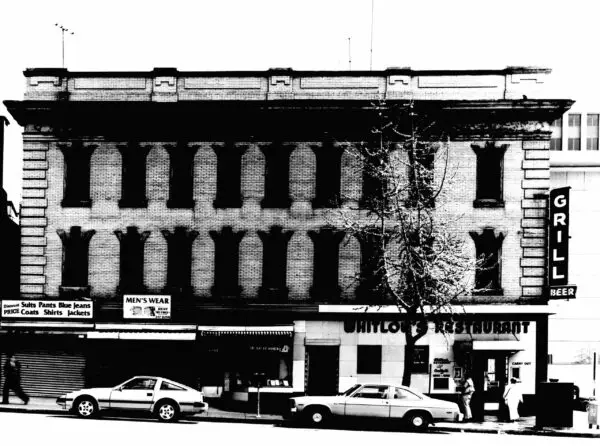 Whitlow's Restaurant and retail stores at 11th and E Streets, N.W., Washington, D.C., photographed before they were demolished to make way for new buildings