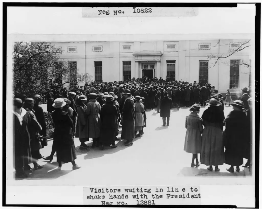 Visitors waiting in line to shake hands with the President (circa 1921)