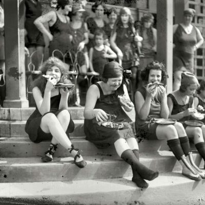 July 31, 1921. Washington, D.C. "Pie eating contest at Tidal Basin bathing beach." In the back row: the blurry but unmistakable facial contours of Iola Swinnerton. National Photo Company Collection glass negative.