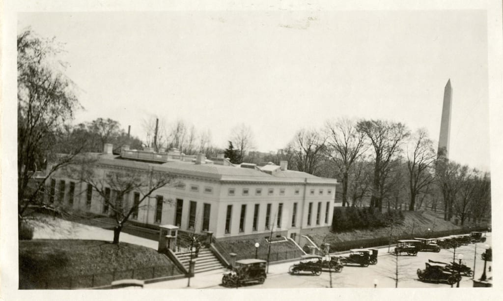 West Wing of the White House with Washington Monument in background