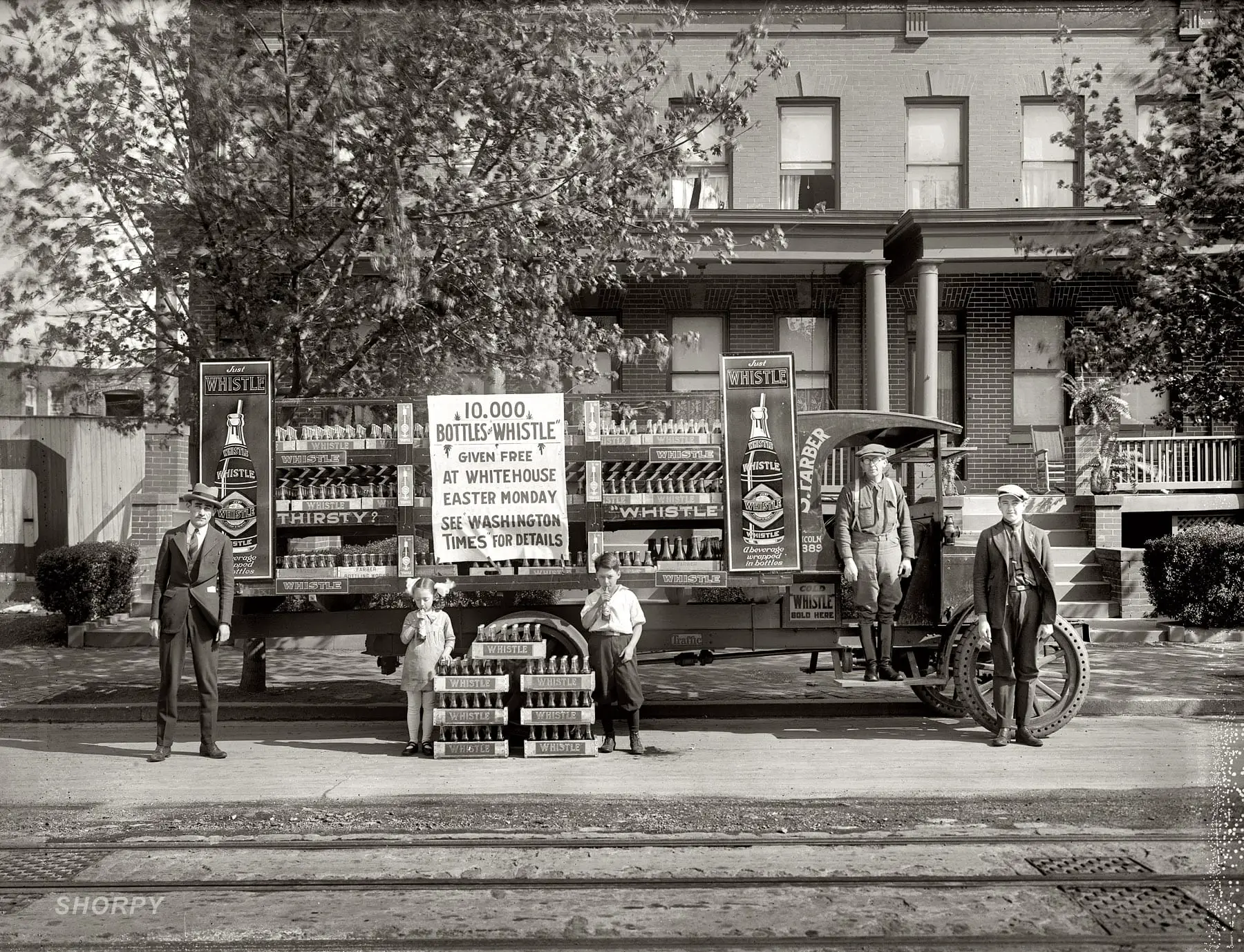 Washington, D.C., 1921. "Whistle car." A truck filled with Whistle, the "beverage wrapped in bottles." National Photo Company glass negative.