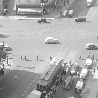 Washington, D.C. A street scene showing street cars crossing at 14th Street and New York Avenue, photographed from a building near the Lotus Club