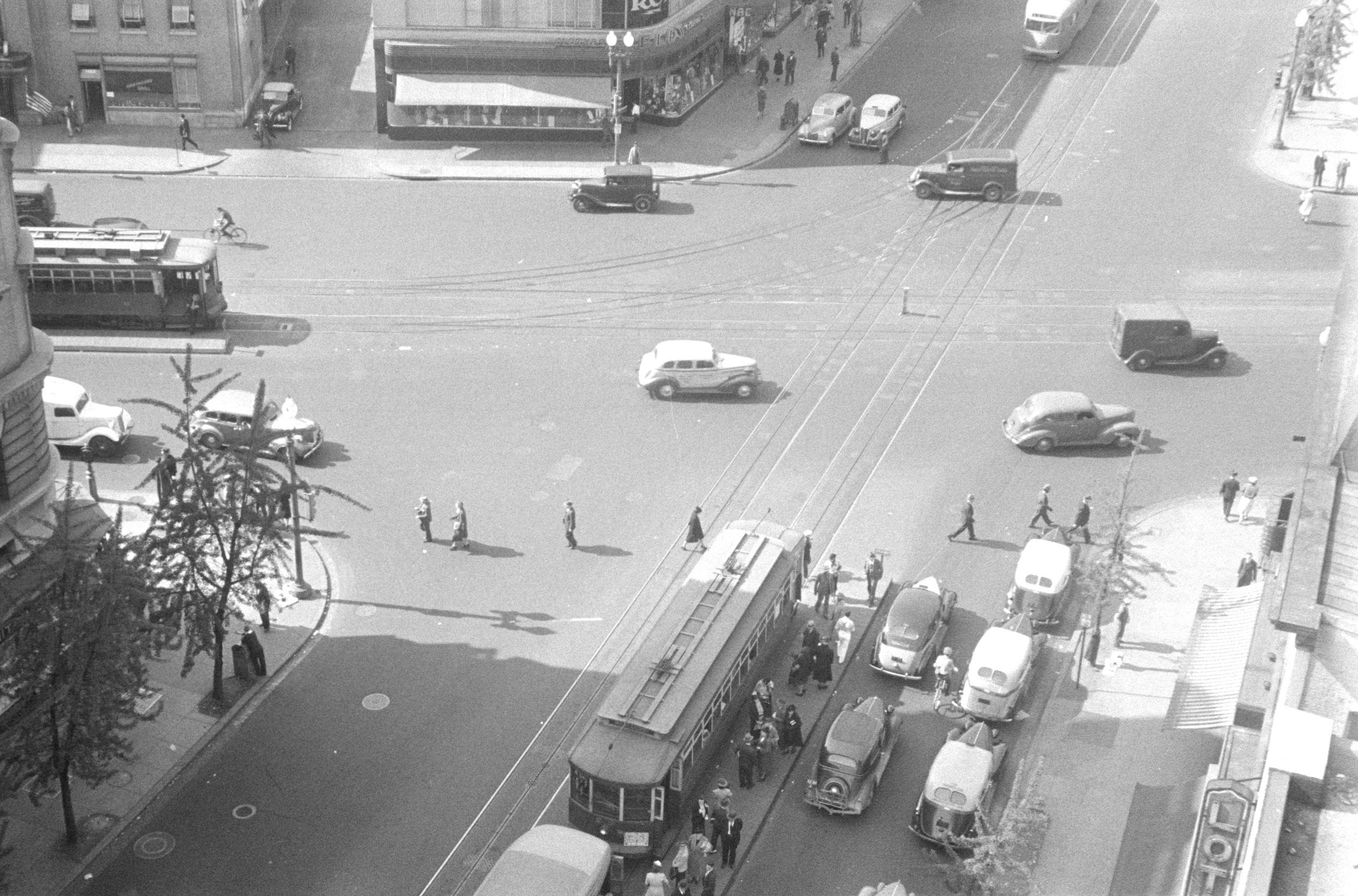 Washington, D.C. A street scene showing street cars crossing at 14th Street and New York Avenue, photographed from a building near the Lotus Club