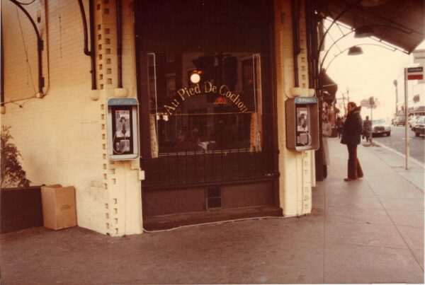 Au Pied De Cochon in 1980 with two payphones