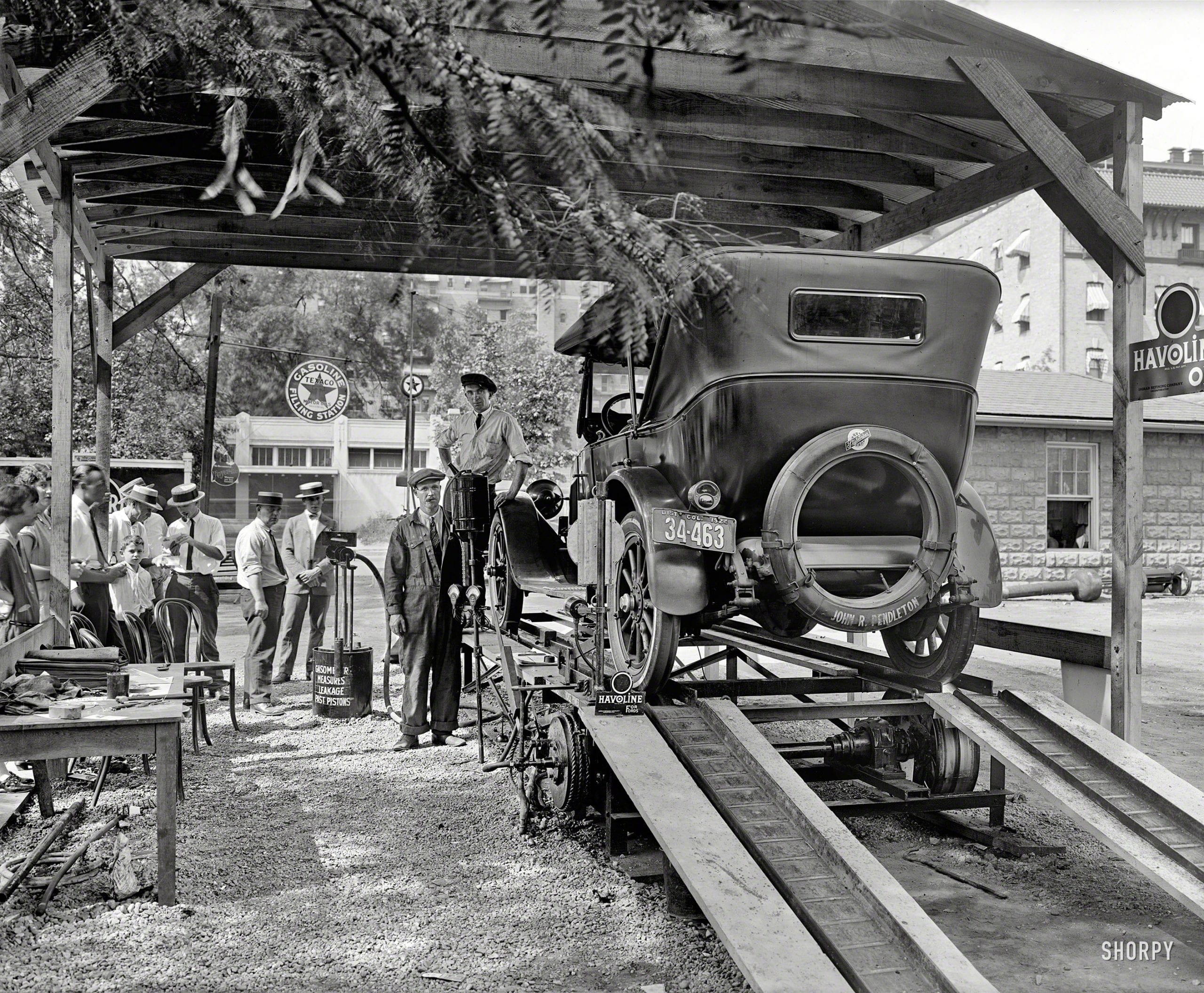 Washington, D.C., 1924. "Havoline Oil Co." Participants in the "Wasson Motor Check" at the Texaco Station on the corner of Florida Avenue and 14th Street. National Photo Company Collection glass negative. 