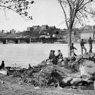 Union soldiers guarding the Potomac River in Washington, DC in 1861. Georgetown University is visible in the background. Photo by George Barnard