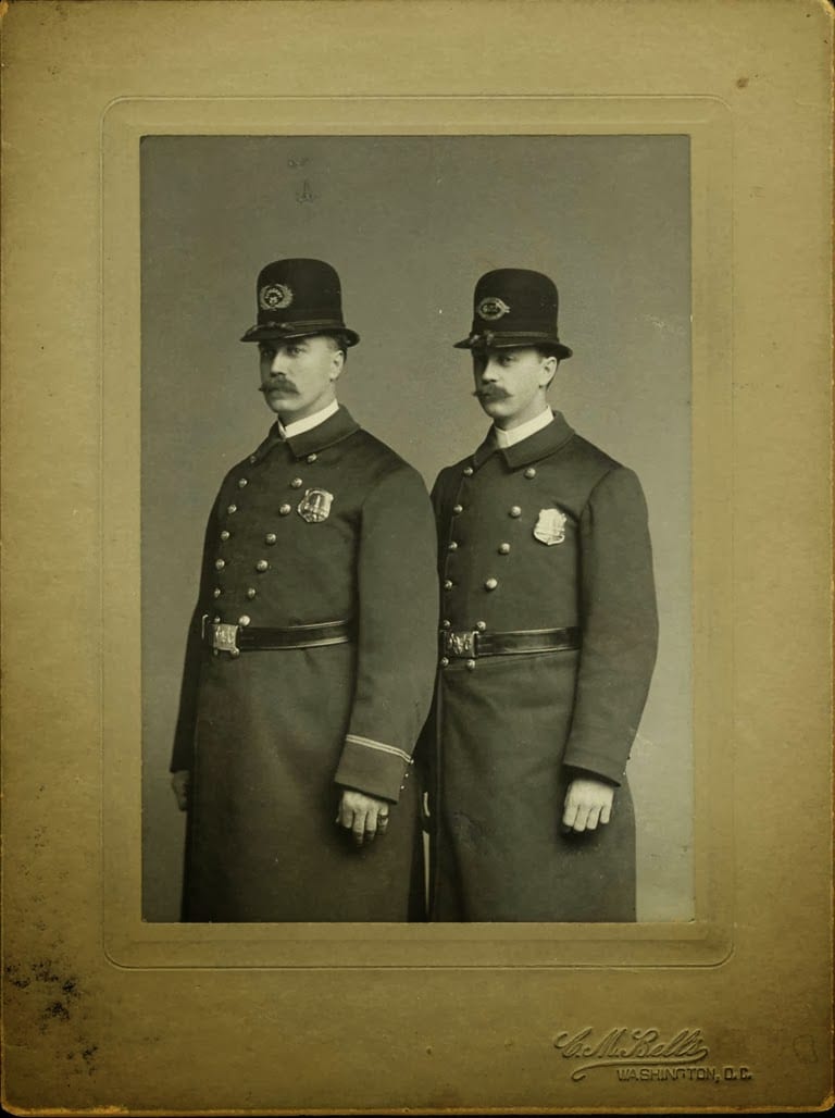 Brothers J.L. and J.F. Sprinkle wearing their DC  Metropolitan Police Department uniforms, 1904. Collection of the National Law Enforcement Museum, 2006.166.1