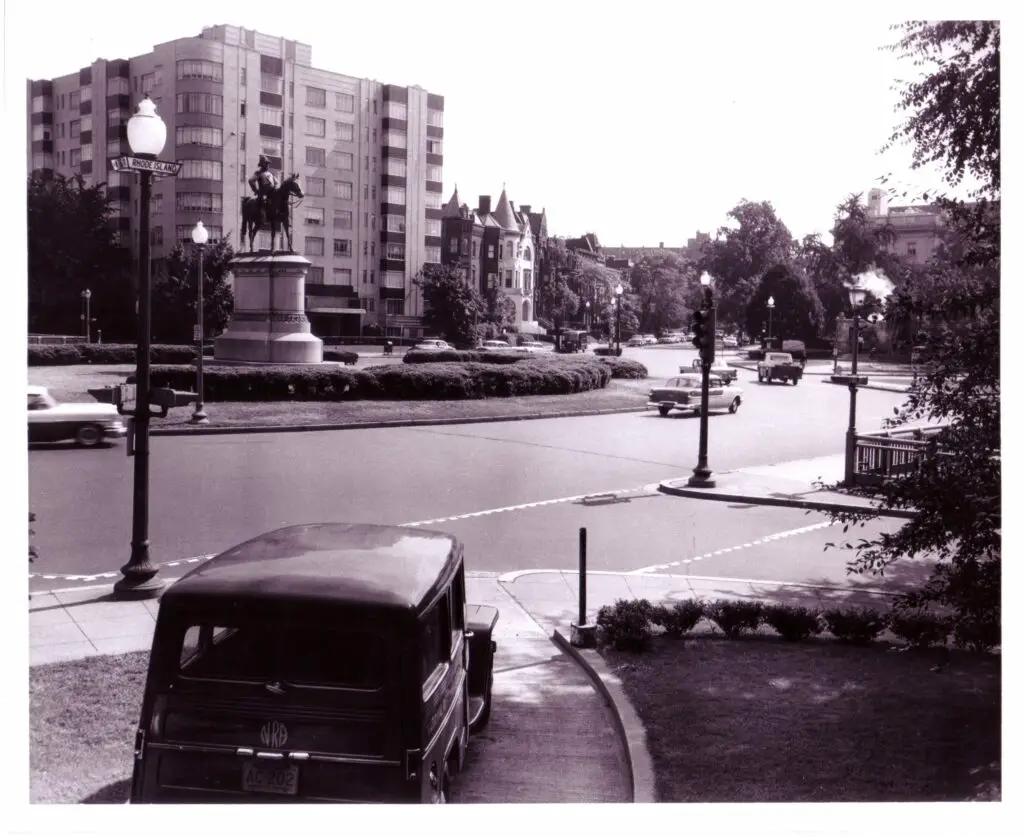 Scott Circle, NW, looking northeast from Rhode Island Avenue with statue of Gen. Winfield Scott; note glass street sign under globe. (July 8, 1950
