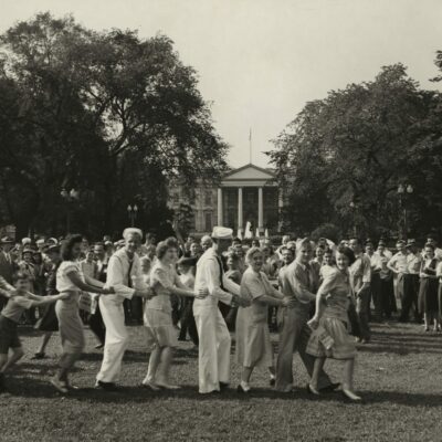 Jubilant crowd on V-J day dancing on the White House lawn