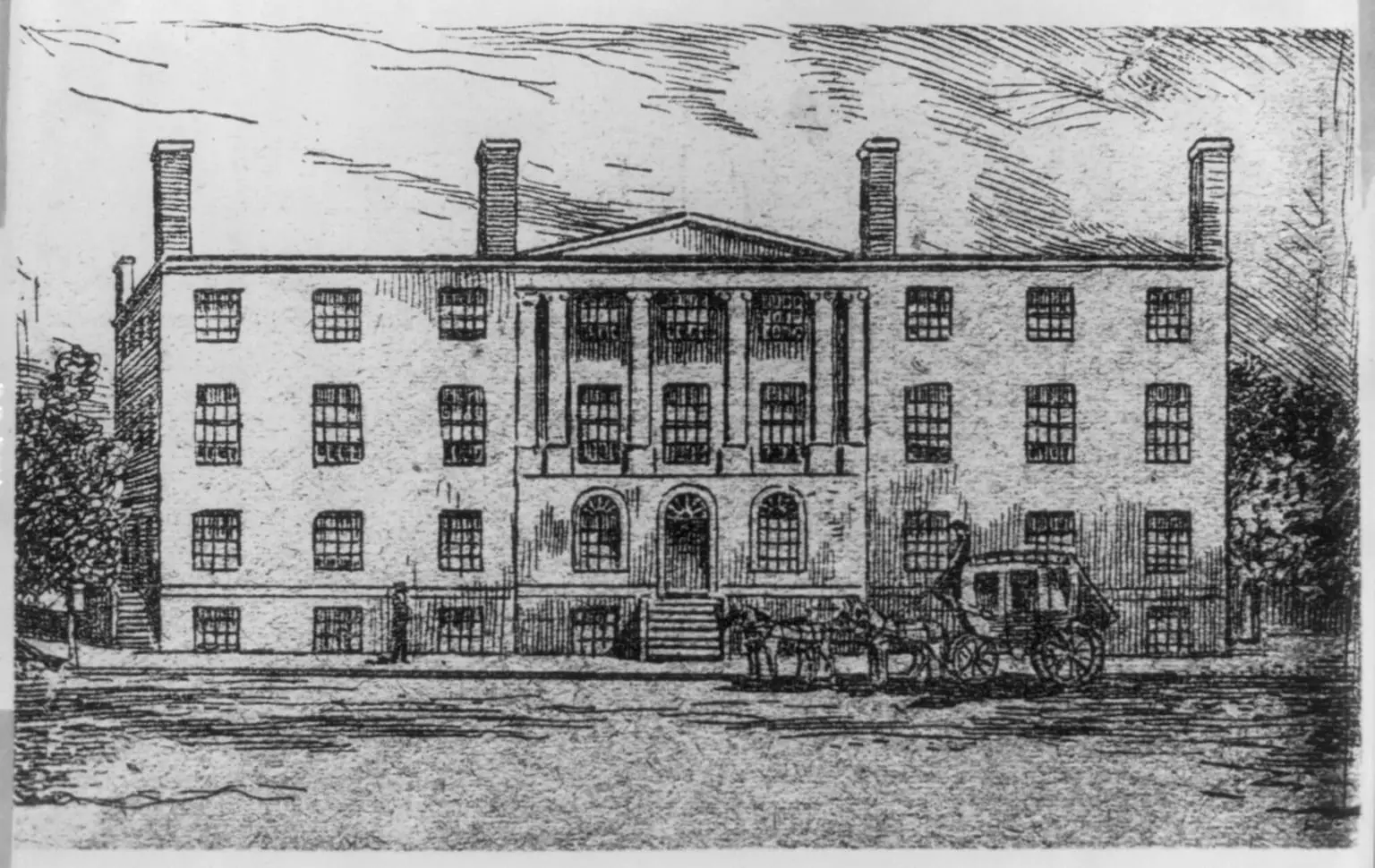 Print shows view from street of Blodget's Hotel with stagecoach parked in front and a person walking on the sidewalk on the left, later (from 1802 to 1836) the U.S. Patent Office.