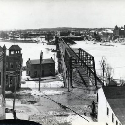 View of Aqueduct Bridge and Rosslyn from Georgetown, ca. 1900. The American Brewery is located in upper right. (Arlington Public Library)