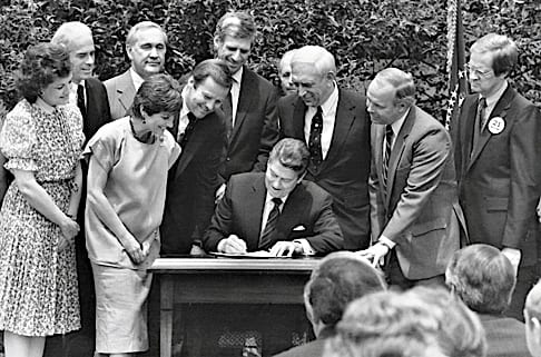 President Reagan signing National Minimum Drinking Age Act into law