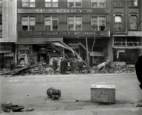 Aftermath of the McCrory disaster, a virtually forgotten chapter in the history of Washington, D.C.: At 1:32 p.m. on Nov. 21, 1929, a boiler in the basement of the McCrory five-and-dime store at 416 Seventh Street NW exploded, demolishing the ground floor and igniting a fire in a deafening blast whose final toll was six dead and dozens injured. Harris & Ewing Collection glass negative.