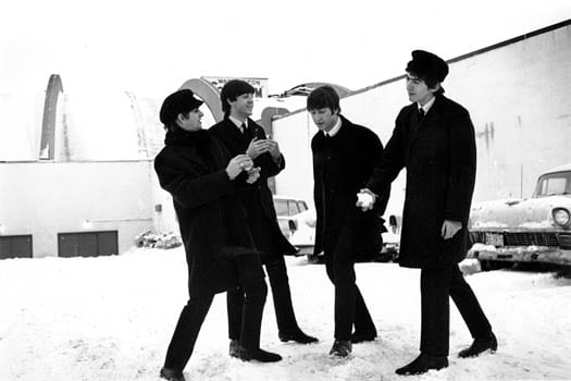 The Beatles play in the snow outside Washington Coliseum