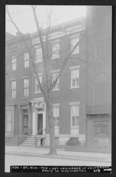 View of 1736 I Street NW, a three-story row house that was the last residence of Jefferson Davis. Flanking each side of the structure are partial views of 1738 and 1734 I Street NW.