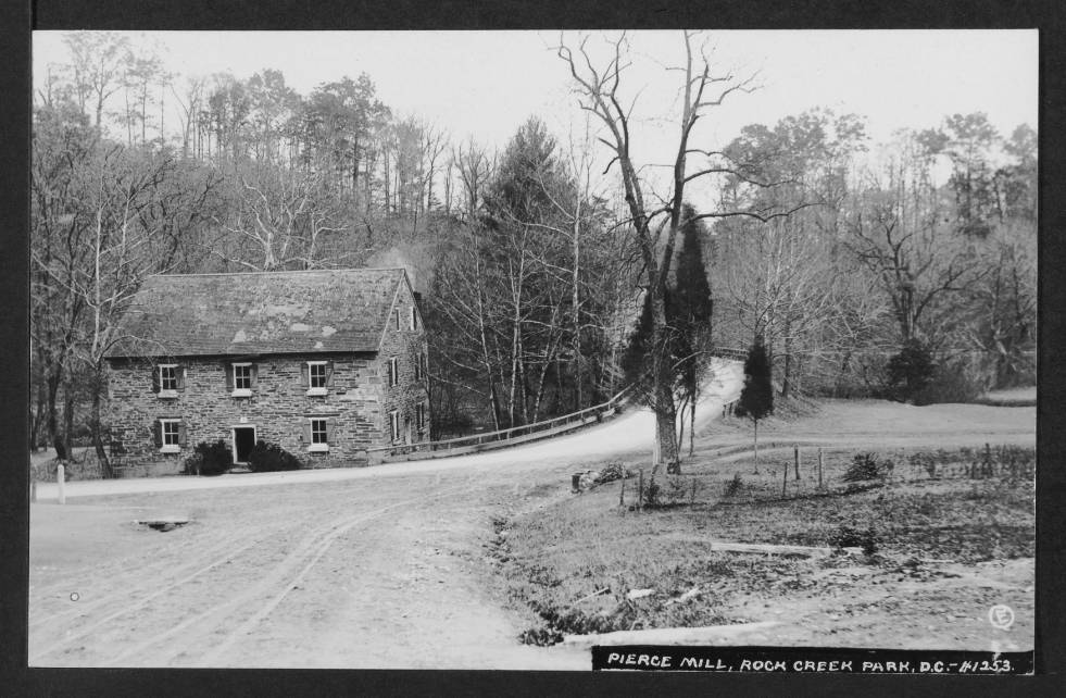 View of south and west elevations of Peirce Mill, to the left of Tilden Street NW as it rises to cross Rock Creek.