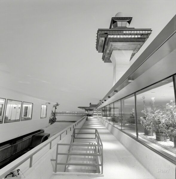 "Dulles International Airport, Chantilly, Virginia, 1958-63. Eero Saarinen, architect. Mobile lounge, control tower and terminal." All we need now is an airplane. Medium format negative by Balthazar Korab.