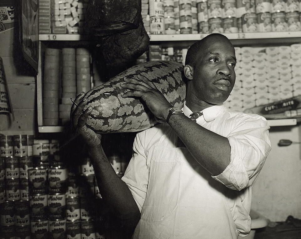 Washington, D.C. Mr. J. Benjamin, owner of the grocery store patronized by Mrs. Ella Watson, a government charwoman