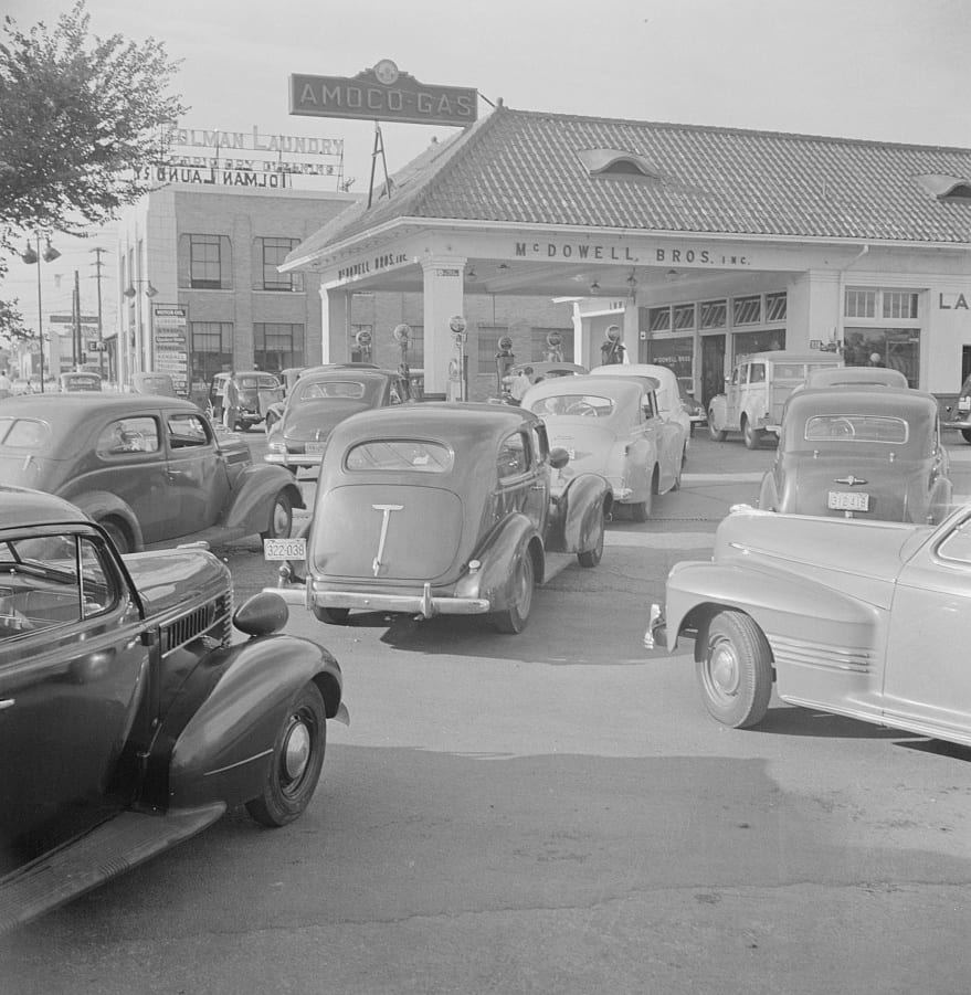 Washington, D.C. At 7 a.m. on June 21st, the day before stricter gas rationing was enforced, cars were pouring into this gas station on upper Wisconsin