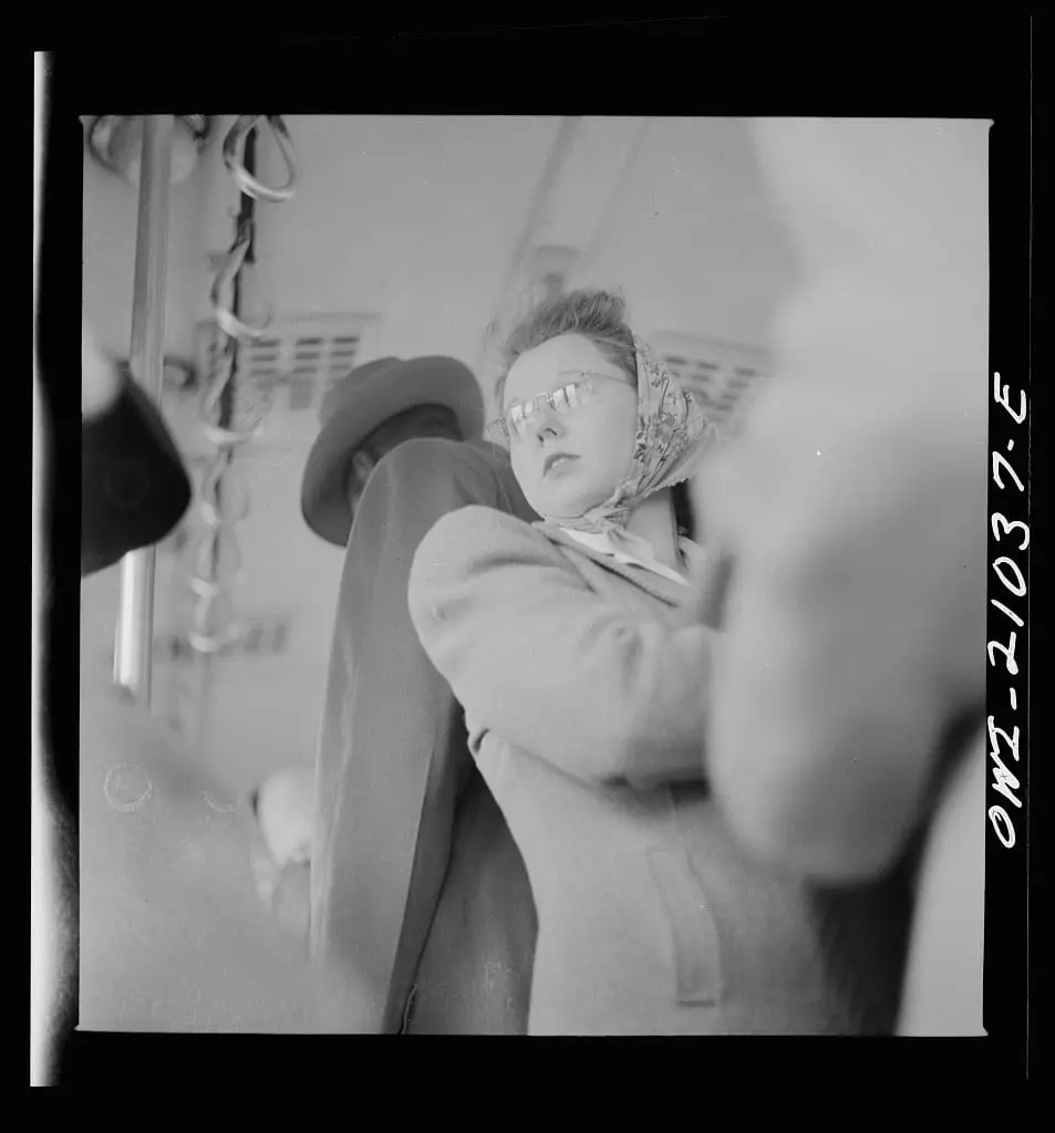 Woman riding streetcar in 1943
