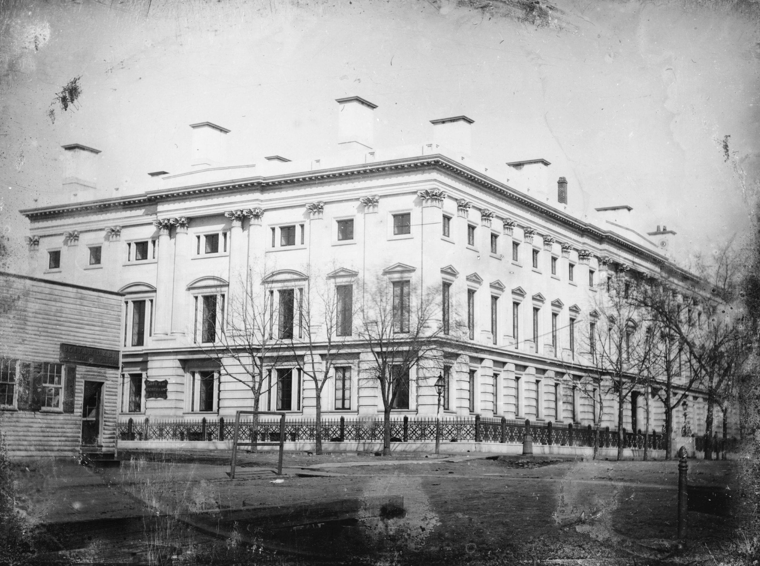 General Post Office from the corner of 8th Street and E Street, NW, Washington, D.C., the shop of Elija Dyer, merchant tailor, on the left