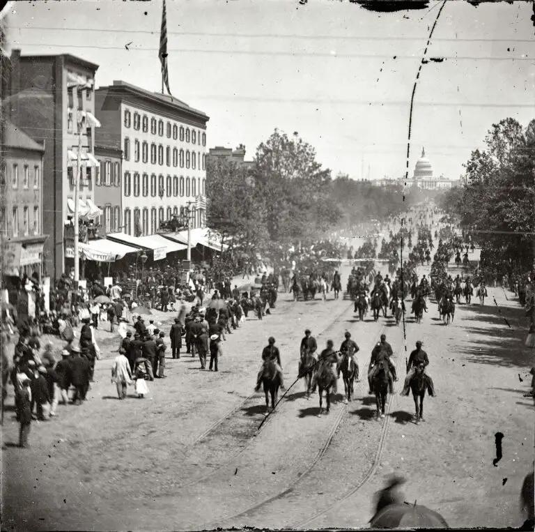 May 1865. "Another artillery unit passing on Pennsylvania Avenue near the Treasury." Wet plate glass negative by Mathew Brady.