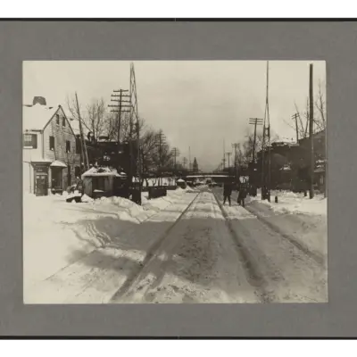 Snowy-street-with-streetcar-tracks-after-blizzard-of-1899