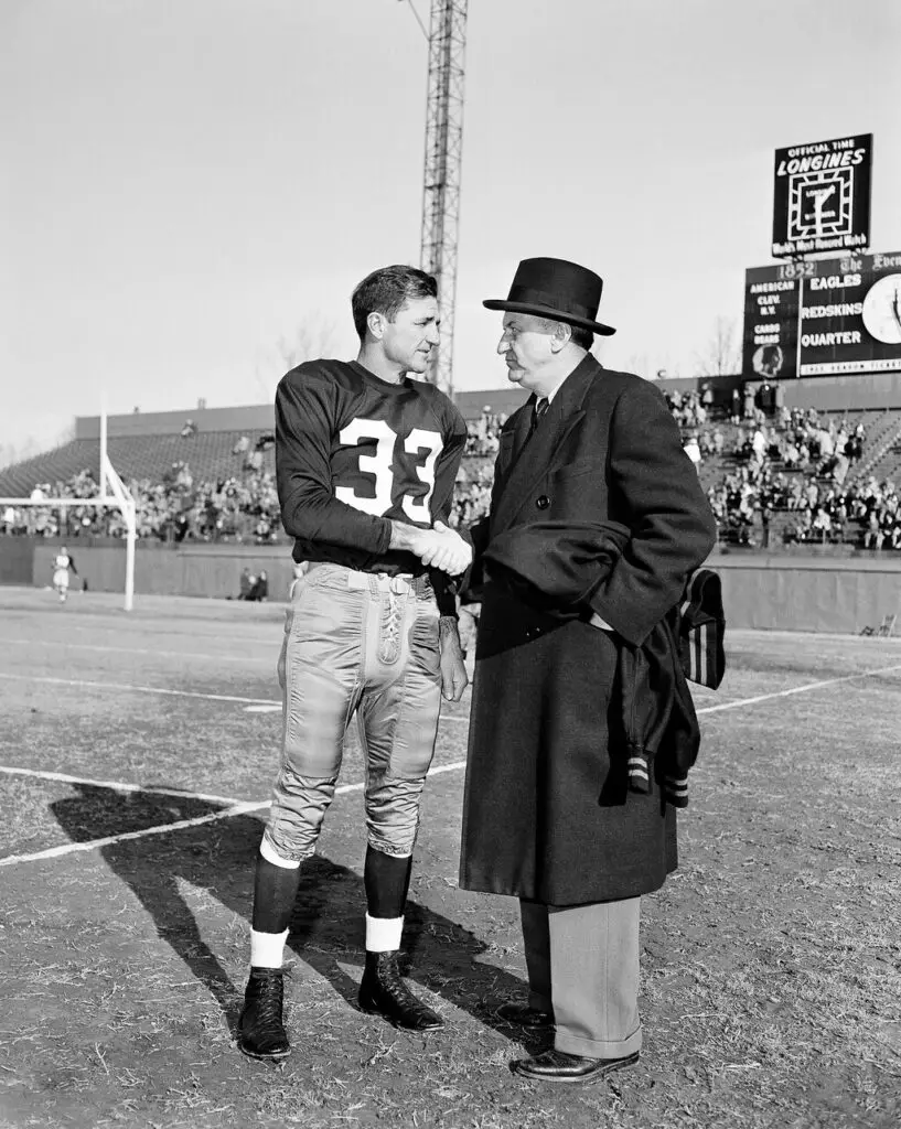 George Preston Marshall, shown with Redskins star Sammy Baugh in 1952